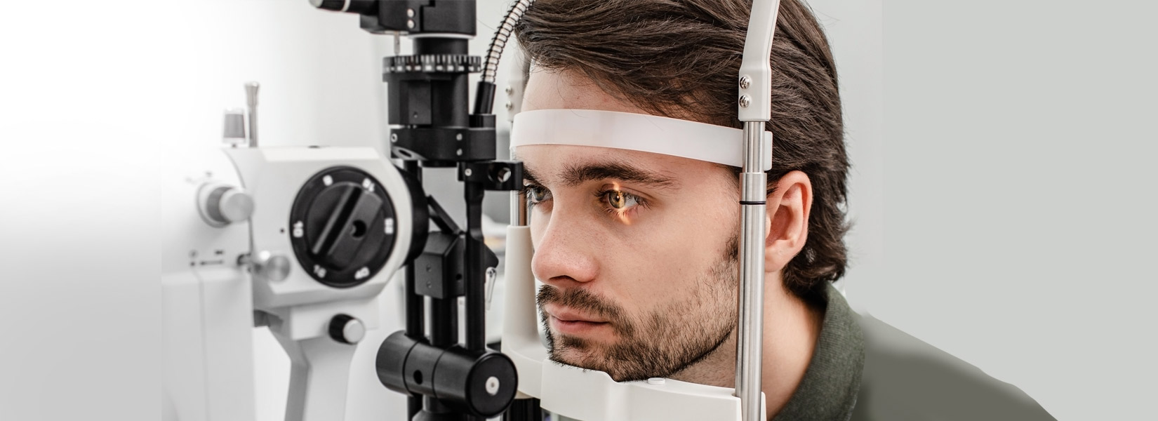 young man during eye exam in Angel's Triangle